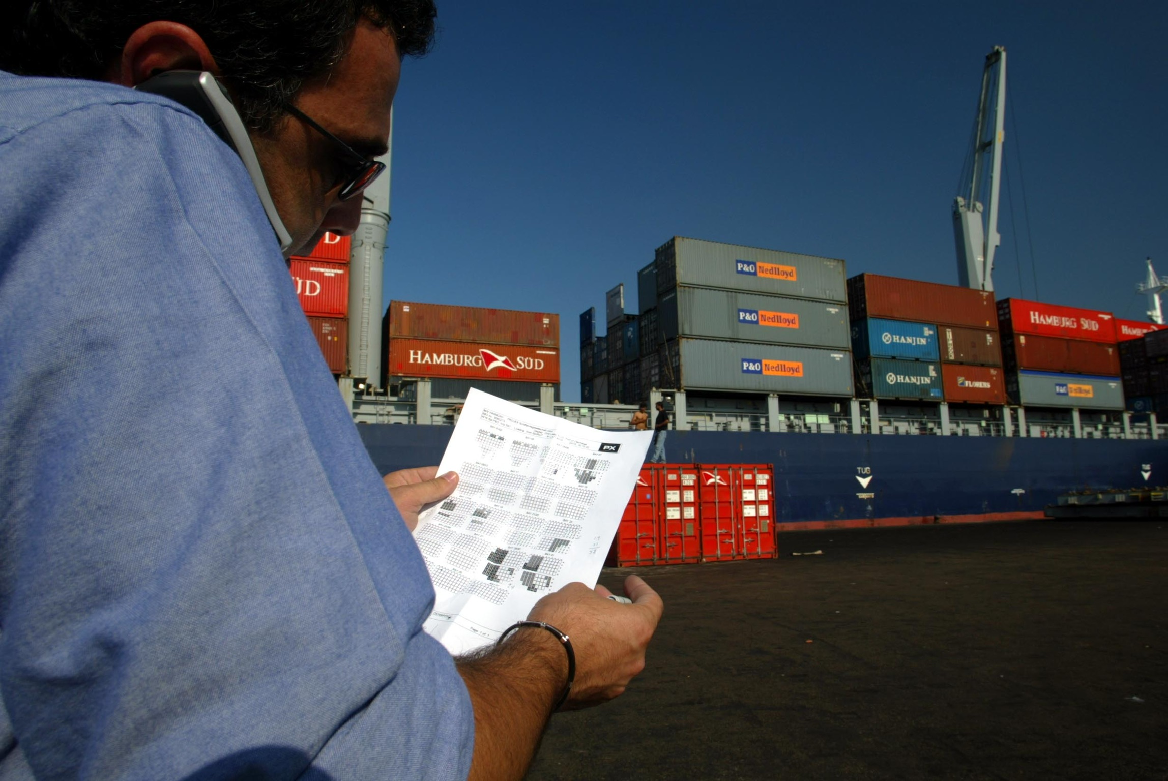 Port agent coordinating vessel operations